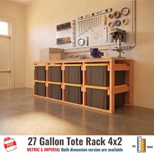 May include: A wooden storage rack featuring eight dark gray 27-gallon totes with yellow lids arranged in two rows. The rack sits against a wall with a pegboard displaying various tools, a blue bench vise, and a drill press on the workbench surface.