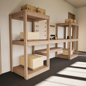 May include: A wooden storage shelving unit with multiple shelves and cardboard boxes. The unit is light brown and has a pegboard and key rack. A small flashlight and other tools are on the shelf. The unit is against a white wall.