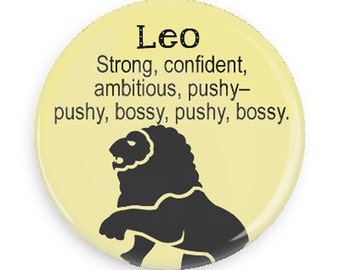 May include: A yellow button with a black lion illustration and the text "Leo Strong, confident, ambitious, pushy-pushy, bossy, pushy, bossy."