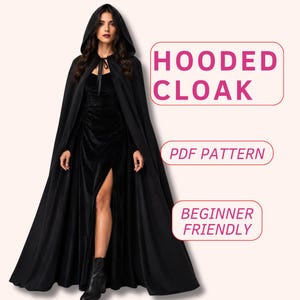 May include: A floor-length black hooded cloak with a tie closure at the neck, worn over a matching black dress with a high leg slit. The image includes text that reads HOODED CLOAK, PDF PATTERN, and BEGINNER FRIENDLY in pink boxes.