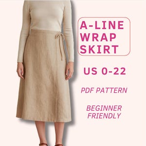 May include: A-line wrap skirt in a light tan color. The skirt is a wrap style and is paired with a long-sleeved cream-colored top. The text on the image reads "A-LINE WRAP SKIRT US 0-22 PDF PATTERN BEGINNER FRIENDLY."