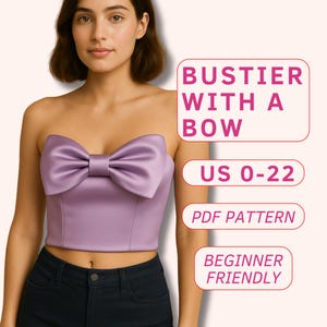May include: A strapless lavender bustier with a large bow detail. The image includes text that reads "BUSTIER WITH A BOW", "US 0-22", "PDF PATTERN", and "BEGINNER FRIENDLY". The bustier is paired with dark blue jeans.