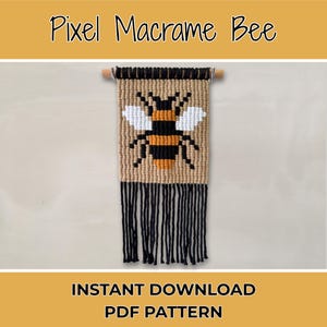 May include: A macrame wall hanging featuring a pixelated bee design. The bee is in black, yellow, and white, with a tan background and black fringe. The text "Pixel Macrame Bee" and "Instant Download PDF Pattern" are displayed.
