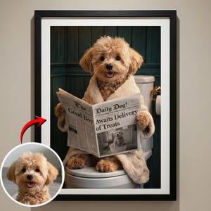 May include: A framed print features a dog in a bathrobe reading a newspaper titled "Daily Dog!" The newspaper headline reads "Awaits Delivery of Treats." The dog is sitting on a toilet. A smaller image of the dog is in the lower left corner.