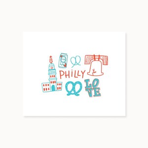 May include: A white card with red and blue illustrations of Philadelphia icons. The design includes a building, a beer can, pretzels, the Liberty Bell, and the words "PHILLY LOVE".