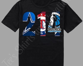 May include: Black t-shirt featuring the number "214" in a stylized design. The "2" is blue with a white star, the "1" is red, white, and blue, and the "4" is blue with a basketball and the word "Maverick".