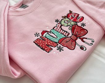 Felpa natalizia ricamata per infermiere: regalo per le feste