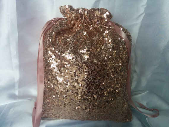 navy and rose gold bag