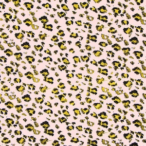 May include: Pink fabric with a black and yellow leopard print pattern.