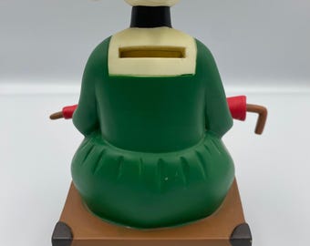Tirelire Bécassine Assise Sur Une Malle - Plastoy - Figurine PVC Collection