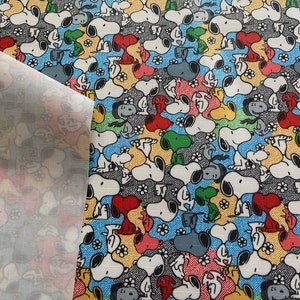 5277 - Tissu imperméable coloré Snoopy - 59 pouces (largeur) x 1/2 yard (longueur)