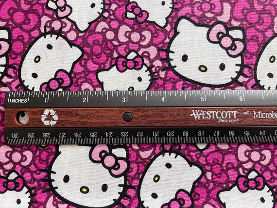 5571 Hello Kitty Head Toss Bowknot Cotton Fabric 43 Inch width X 1 