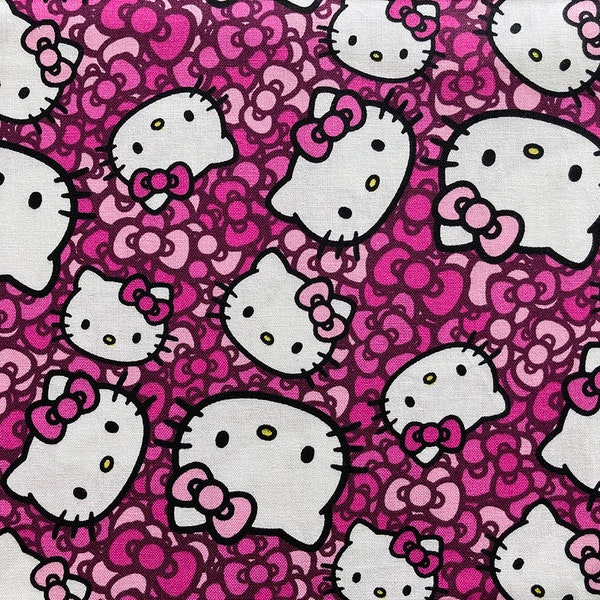 5571 - Hello Kitty Head Toss Bowknot Cotton Fabric - 43 Inch (Width) x 1/2 Yard (Length)