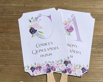 Elegant Quinceanera favor fans adorned with lavender flowers and monogram.  Personalized fans for the guest of honor, a wonderful keepsake.