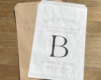 Monogrammed wedding favor bags, personalized for the bride and groom.  Love is sweet thank you for making our day complete candy favor bags