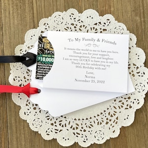 Unique adult birthday party favors, each envelope printed with a sweet thank you to your friends and family for celebrating your birthday with you.  Personalized birthday favors, slide a lottery ticket in the envelope and see who wins.