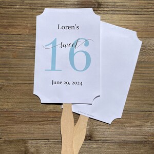 Sweet 16 favor fans that are personalized for the guest of honor.  Fans are printed on white card stock with your choice of the large 16 number color.  They come fully assembled, two sided with handle hidden between.