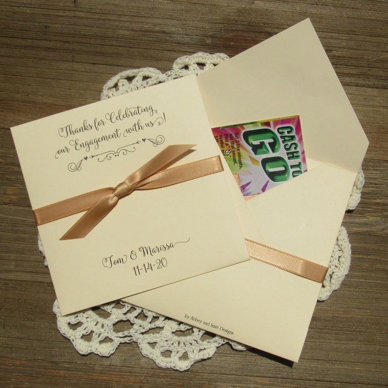 Unique engagement party favors, personalized for the bride and groom.  Fill each with a gift card or lottery ticket to thank your guests for celebrating with you.  Your choice of envelope and ribbon color to match your theme.