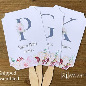 Monogrammed wedding fans personalized for the happy couple!  Let us do the work, these fans ship to you assembled and ready for the big day.