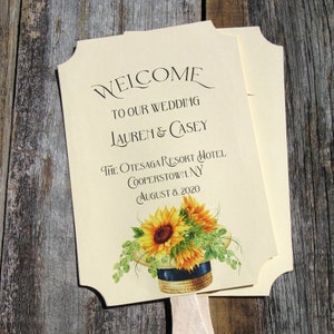 Personalized sunflower wedding guest fans, keep your guests cool and comfortable.  Favor fans are the perfect keepsake to take home.