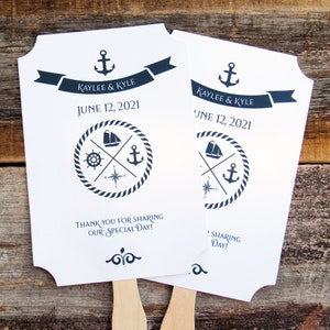 Nautical wedding fans, printed on white card stock with navy text and details.  Fans are personalized for the bride and groom with names and date.  Fans are shipped fully assembled, two sided with hand hidden between.