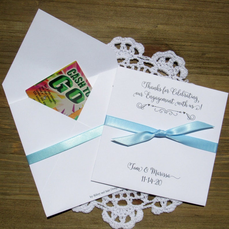 Unique engagement party favors, personalized for the bride and groom.  Fill each with a gift card or lottery ticket to thank your guests for celebrating with you.  Your choice of envelope and ribbon color to match your theme.