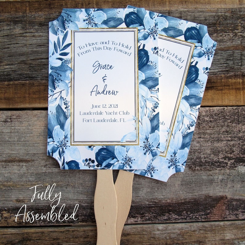 Navy blue wedding guest fans, personalized for your special day.  Elegant floral frame with 'to have and to hold from this day forward', names, date and place.  Shipped to you assembled and ready for your day.