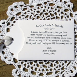 Favors for a 25th wedding anniversary, personalized for the happy couple.  Printed on white card stock, your choice of ribbon color to match your party theme.  Slide a lotto ticket in the envelope for a fun anniversary party favor.
