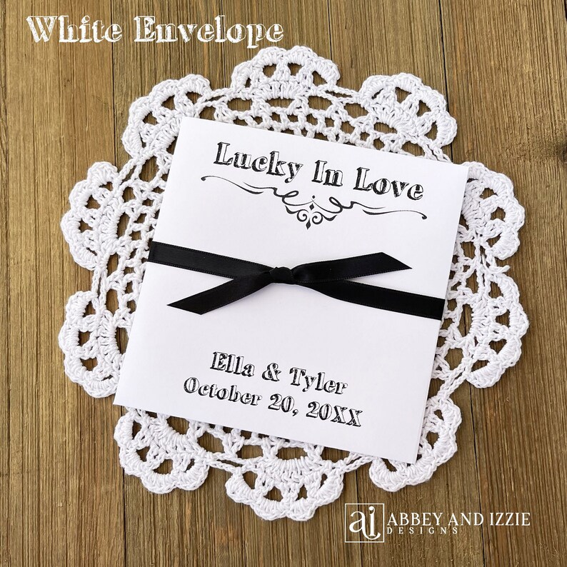 Lucky in love lottery ticket envelopes for wedding favors.  Slide a lotto ticket in these personalized envelopes for a fun favor.  Your choice of envelope and ribbon color, ribbon included and comes attached.  Easy and fun wedding guest favors.