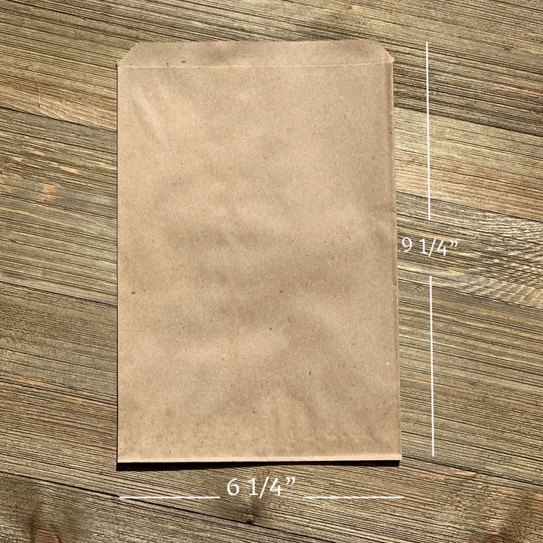K&ouml;nnte beinhalten: Eine braune Papiert&uuml;te mit den Ma&szlig;en 16 cm Breite und 24 cm H&ouml;he.