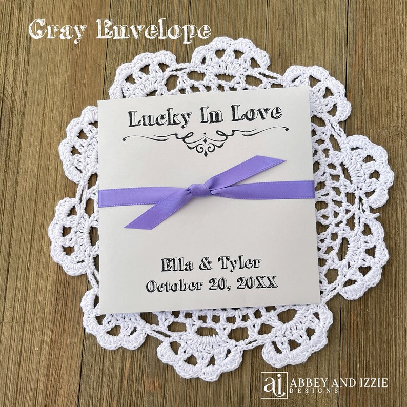 Lucky in love lottery ticket envelopes for wedding favors.  Slide a lotto ticket in these personalized envelopes for a fun favor.  Your choice of envelope and ribbon color, ribbon included and comes attached.  Easy and fun wedding guest favors.