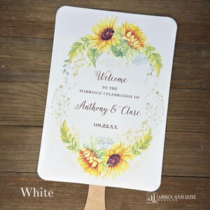 Sunflower wedding fans , personalized for the bride and groom and adorned with a ring of sunflowers.  Fans are printed on ivory or white cardstock, two sided so handle is hidden between.  Wedding fans ship fully assembled and ready for your big day.
