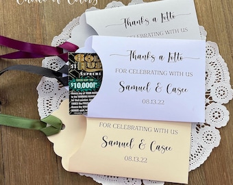 Thanks a lotto personalized wedding favors, slide a lottery ticket in these cute envelopes to see who wins.  Wedding favors for guests.