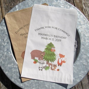 Wildlife Birthday Favor Bags personalized for the guest of honor.  Woodland party favors with woodland creatures printed.