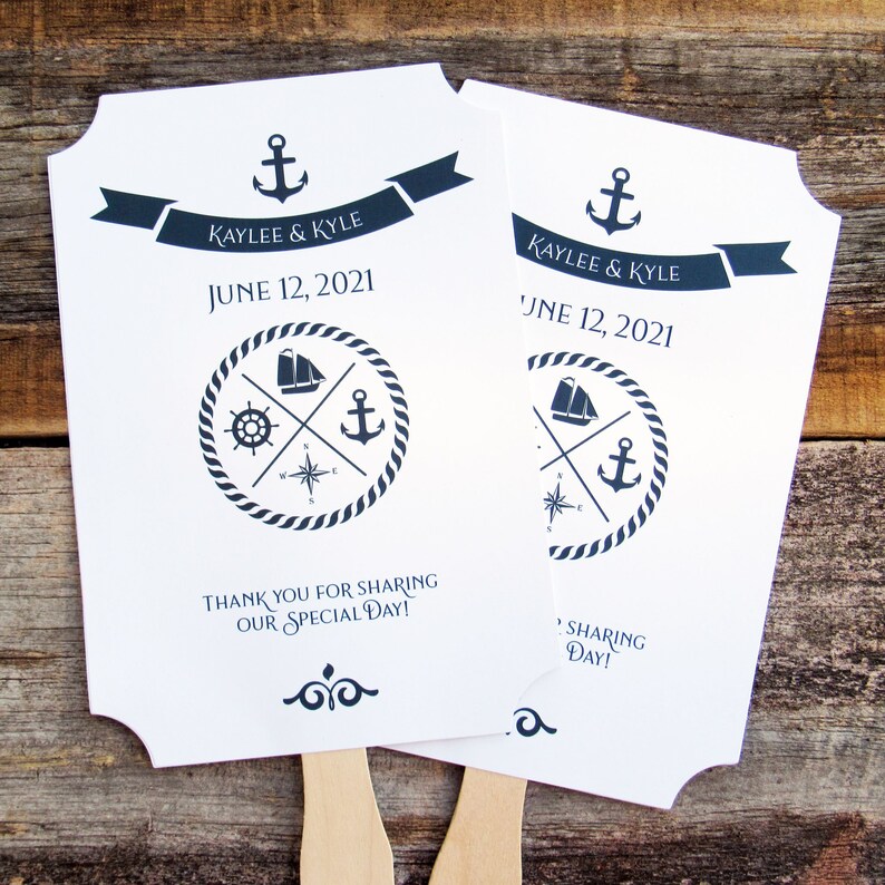 Nautical wedding fans, printed on white card stock with navy text and details.  Fans are personalized for the bride and groom with names and date.  Fans are shipped fully assembled, two sided with hand hidden between.