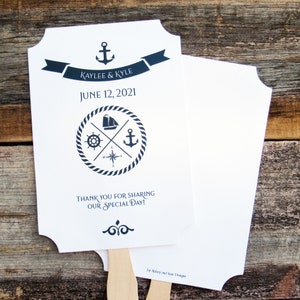 Nautical wedding fans, printed on white card stock with navy text and details.  Fans are personalized for the bride and groom with names and date.  Fans are shipped fully assembled, two sided with hand hidden between.
