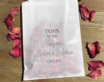Wedding petal toss bags personalized for the bride and groom.  Flower confetti bags are glassine add your petals for a memorable exit.