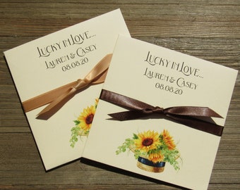 Sunflower wedding favors that are personalized for the bride and groom.  Add a scratch off lotto ticket for a fun and easy wedding favor.