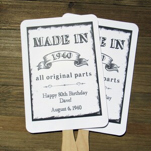Adult brithday party favor fans, personalized for the guest of honor.  Keep your guests cool while providing them with a keepsake to take home from the party.  Made in year along with all original parts printed on these fans that come fully assembled