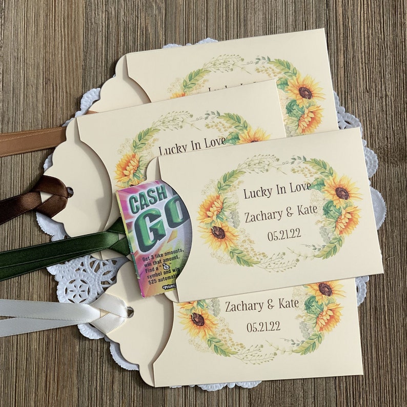 Sunflower wedding guest favors, printed on ivory cardstock these envelopes are the perfect size to slide in a lottery ticket.  Personalized for the bride and groom.
