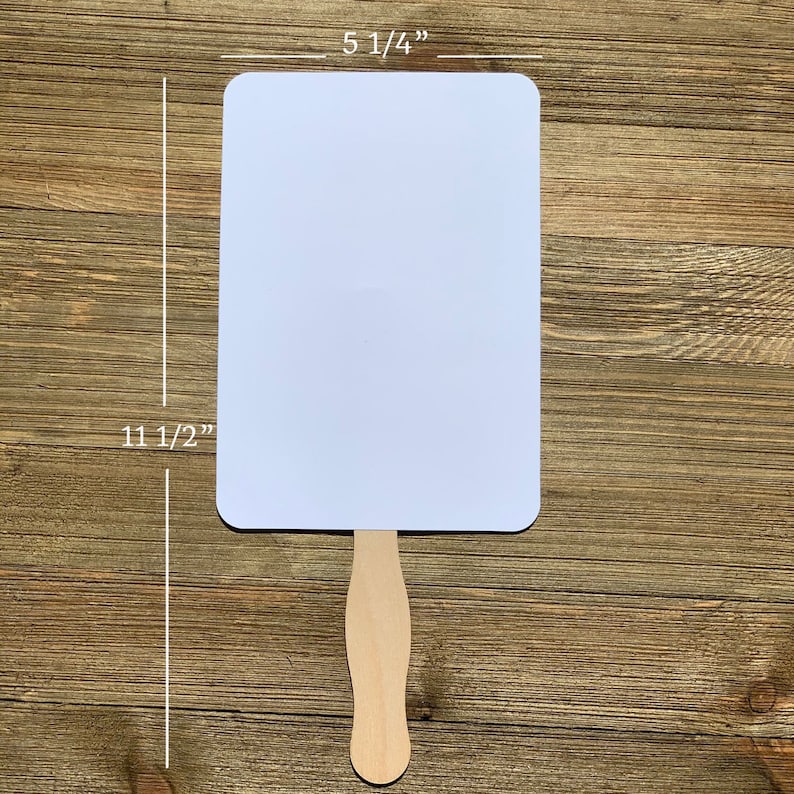 May include: White blank hand fan with a wooden handle. The fan measures 5 1/4 inches wide and 11 1/2 inches tall.