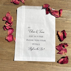Wedding petal toss bags are personalized for the bride and goom.  As they exit as a pair please toss your petals high in the air.  Printed on glassine bags for a more elegant feel, larger than most petal bags they will hold plenty of flower petals.
