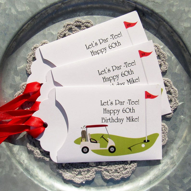 Golf birthday party favors, personalized for the guest of honor, printed on white card stock adorned with a red ribbon.  Let's Par Tee golf favors, slide a lotto ticket in for a fun birthday favor.
