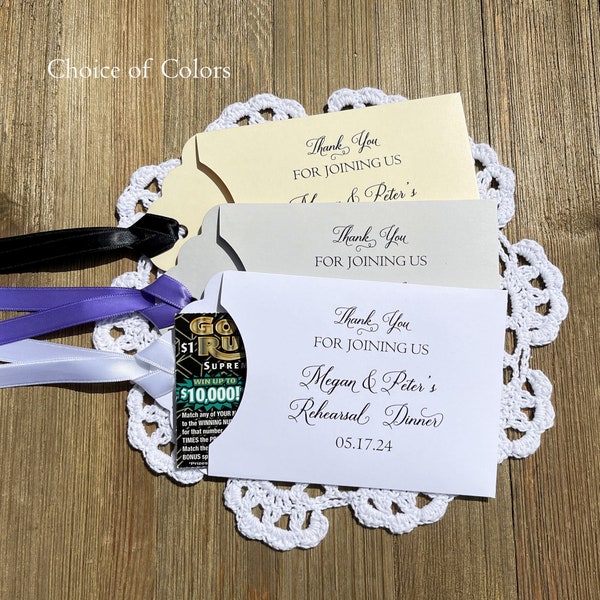 Personalized rehearsal dinner favors to thank your guests for joining you to help celebrate.  Slide a lottery ticket in each envelope.