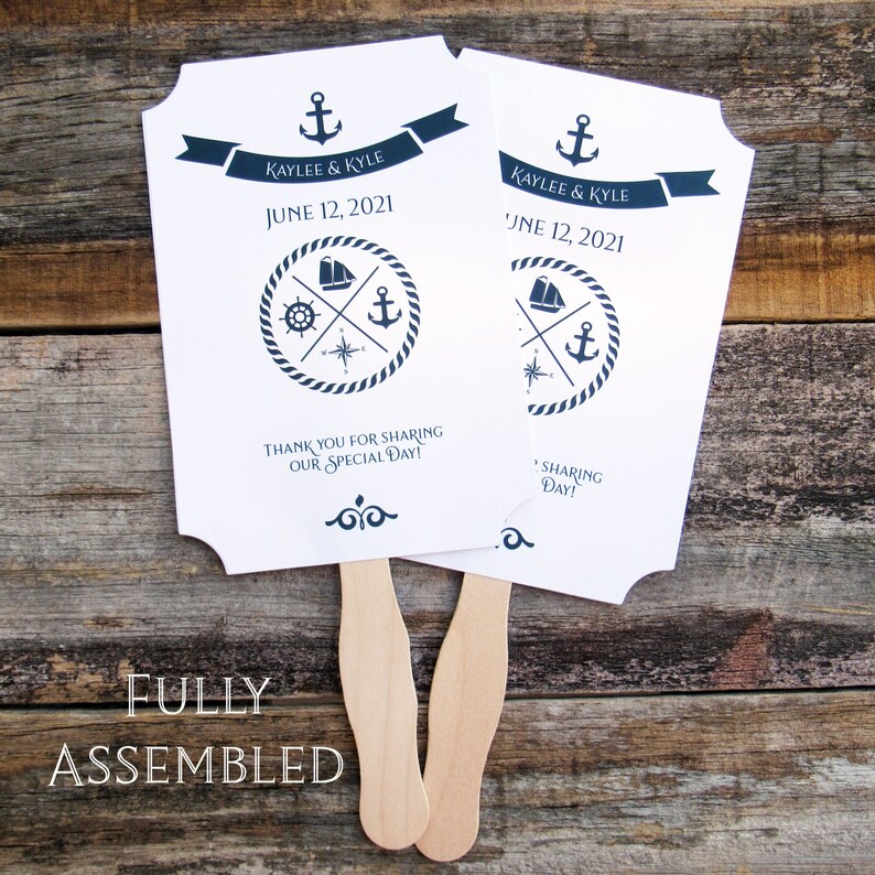 Nautical wedding fans, printed on white card stock with navy text and details.  Fans are personalized for the bride and groom with names and date.  Fans are shipped fully assembled, two sided with hand hidden between.