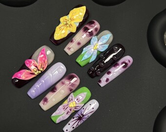 De "Midnight Dew"-collectie: 3D-persnagels met lelie en bubbelkunst