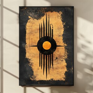 May include: Abstract art print in a black frame. The artwork features a central black circle with a yellow center, surrounded by vertical black lines and horizontal lines. The background is a textured tan color with black borders.