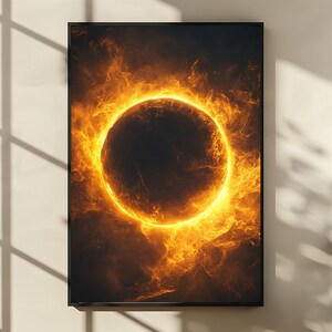 May include: A fiery orange and yellow ring of fire surrounds a dark circle, creating a dramatic and abstract image.