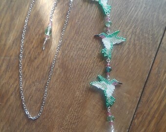 Dancing green hummingbirds Suncatcher