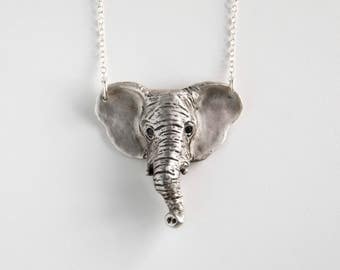 Hand Carved Silver Elephant Head Necklace, with black spinel stones in eyes